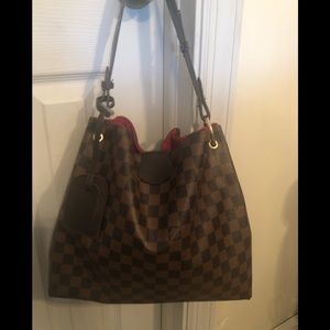 LV stylish bag in good condition.
